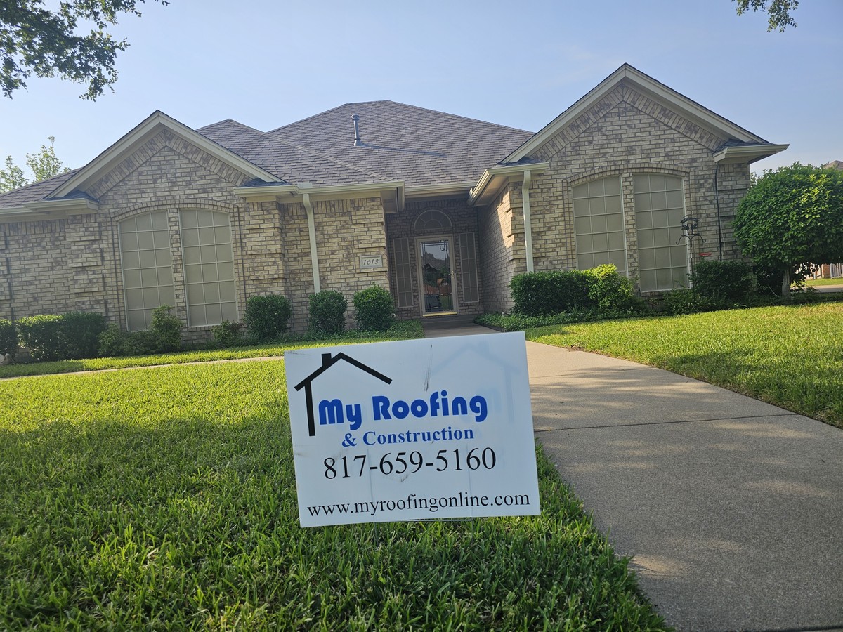Completed roof with My Roofing yard sign in Johnson County, TX