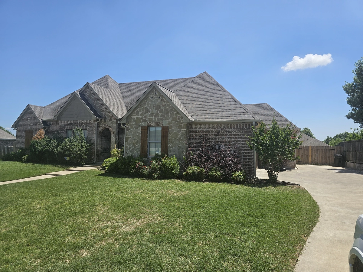 Completed roof replacement exterior view in Cleburne, TX by My Roofing