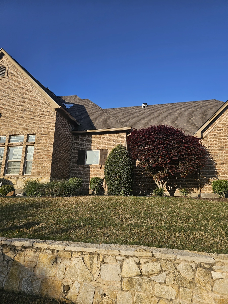 New roof replacement with blue sky in Cleburne, TX by My Roofing
