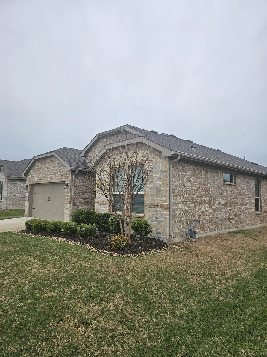 New roof with landscaped property in Cleburne, TX by My Roofing