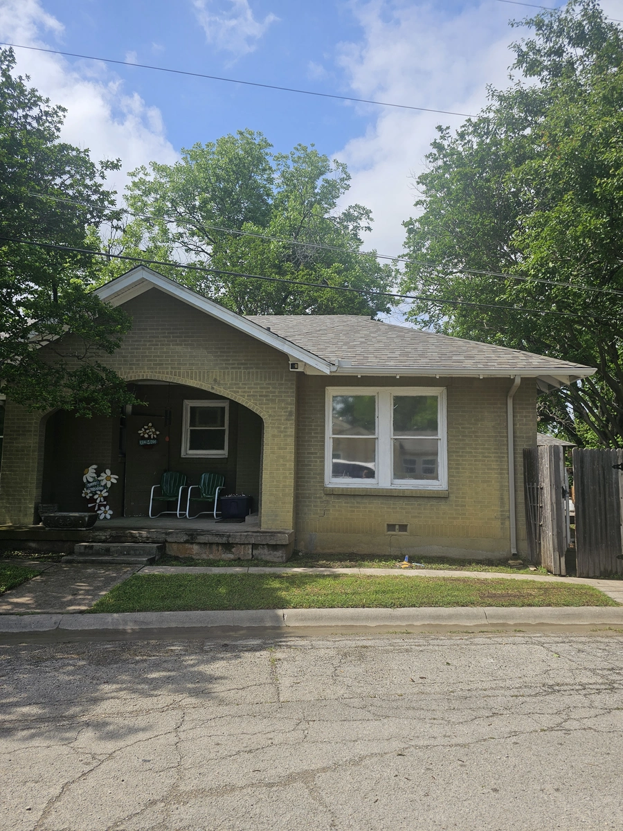 Roofers installing asphalt shingles in Johnson County, TX