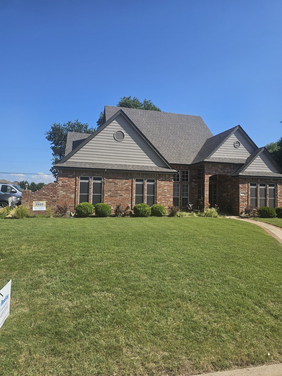 Residential roofing project with yard sign in Johnson County, TX